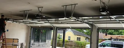 Garage interior during track and opener repair work