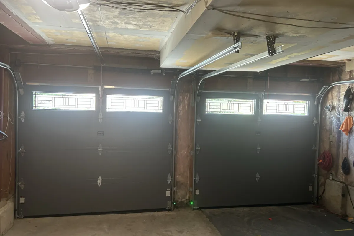 Garage doors with new torsion springs seen from inside