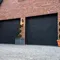 Black carriage-house garage doors